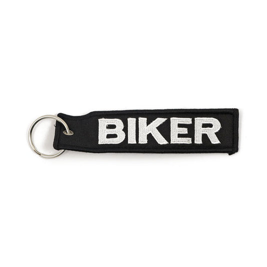 Weißer schwarzer Biker -Schlüsselbund
