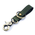 Llavero Trip Machine verde militar/oro antiguo
