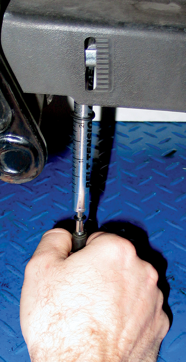 como comprobar tension correa harley-davidson